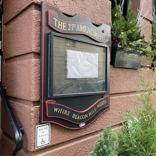 a sign on the side of a building