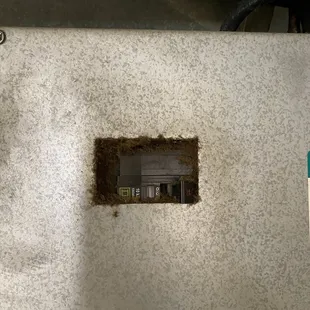 Dirt and missing cover