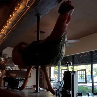 Eclectic decorations inside the restaurant, including this large carousel rooster that was staring down at me.