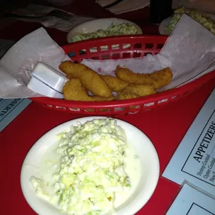 Hush puppies and cole slaw comes with every meal