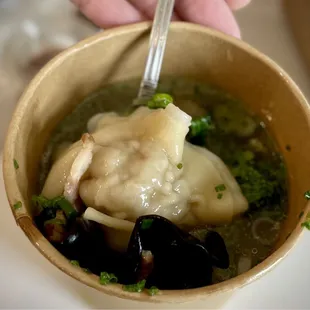 Kurabuta pork and truffle oil dumpling soup ($14.50)