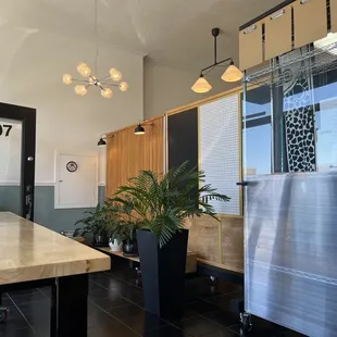 a view of a kitchen with stainless steel appliances