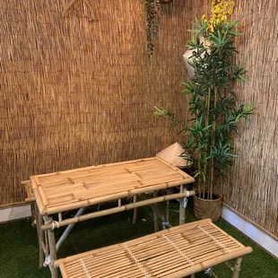 a bamboo table and bench