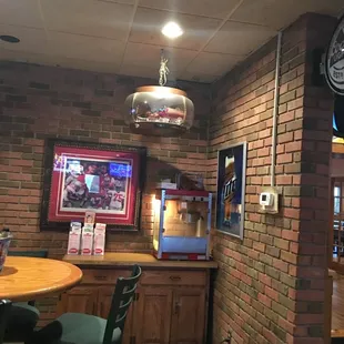 a bar with a brick wall