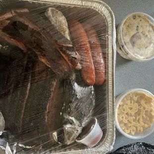 Brisket, beef rib, pork rib, sausage link, Mac and cheese, potato salad