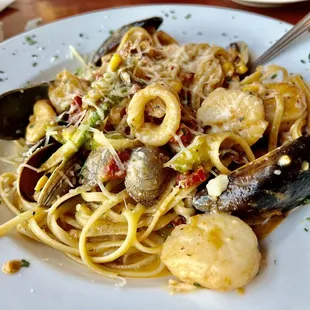 a plate of seafood pasta