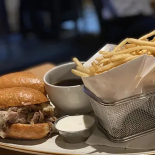 a plate with a sandwich and french fries