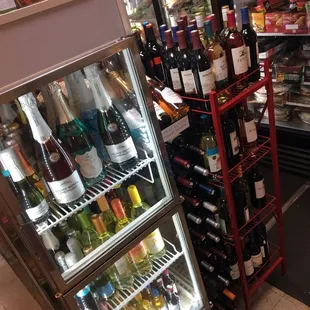 bottles of wine in a refrigerator