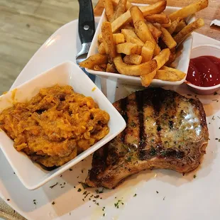 pork chop with fries and sweet potato casserole