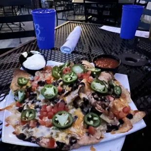 Loaded assembled nachos (no meat just bean and cheese), added jalapeños and ordered a side of guac not shown. So good!