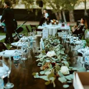 Our rustic Vineyard tables are the perfect foundation for this stunning garland.