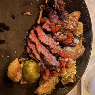 steak and vegetables in a skillet