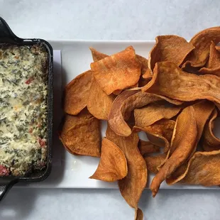 Warm Kale and Parmesan dip with sweet potato chips. Enough to share.