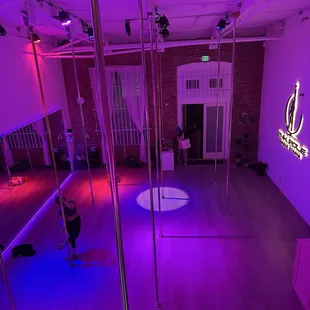 Pole studio dance space.