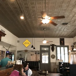 interior look, metal ceiling and soft country music playing