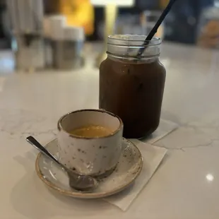 Thia iced coffee and a shot of espresso