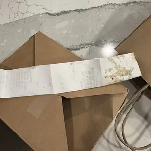 The receipt stuck inside my food