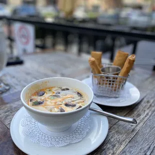 Coconut soup with chicken and crab cheese rolls