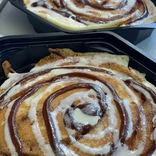 Cinnamon Roll Pancakes with Cinnamon and cream cheese drizzle