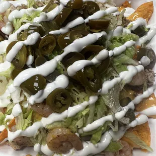 Nacho supreme with your choice of meat