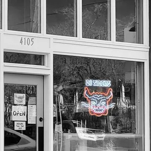 a black and white photo of a restaurant