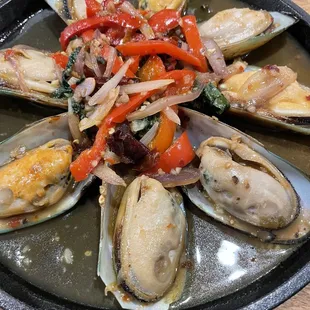 Steamed mussels. They have a little kick to them (which I loved)