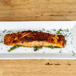grilled salmon on a white plate