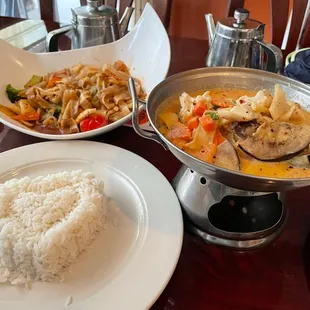 Drunken noodles with chicken and red curry with chicken.