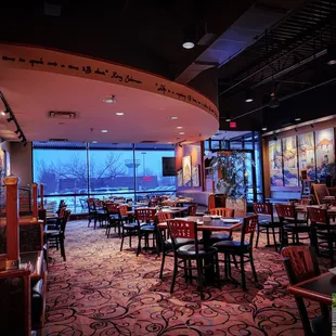 a restaurant with a view of the city