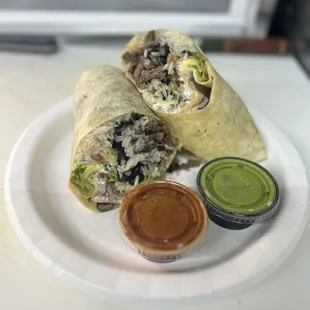 two burritos on a plate