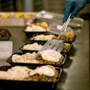 a person in a kitchen preparing food