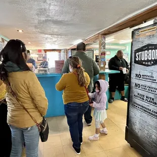 a group of people standing in line