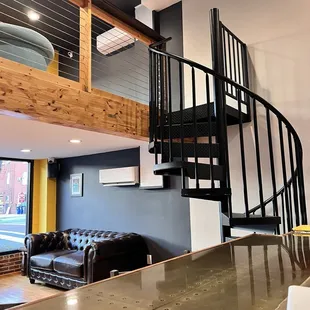 Spiral stairs to more seating