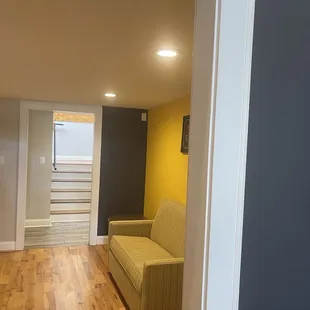 a view of a living room from the hallway