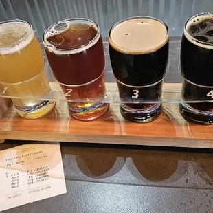 Flight of beer with 1. Hazed and Confused, 2. Hammond's Amber, 3. Harry Porter, 4. Toothless