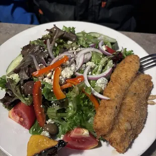 Lightly breaded white fish on top of the house salad with a little added Gorgonzola. Superb!