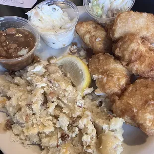 Deep, fried fish, garlic, mashed potatoes, beans, coleslaw delicious