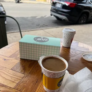 Outside seating enjoying coffee