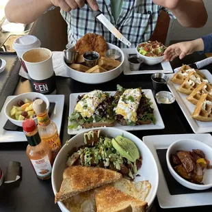 Chicken and Cookie Butter Waffles (top), classic Waffles (right), El Paso Toast (center) and Chuco Hash (bottom)