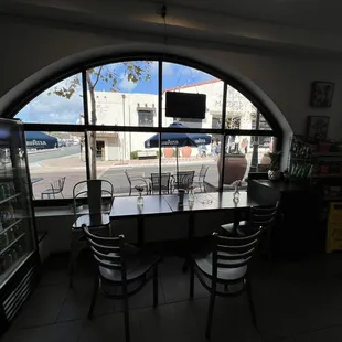 Opened Front windows into sidewalk , seating area