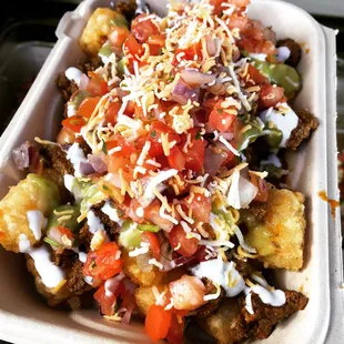 ows a tray of taco salad