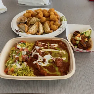 Chicken tikka masala bowl, Korean spicy pork taco, tater tots, and Korean potstickers.