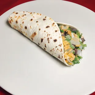 8 INCH CLASSIC BURRITO WITH RICE, BEANS, CHEDDAR CHEESE, ONIONS,CILANTRO WITH A CHOICE OF MEAT.