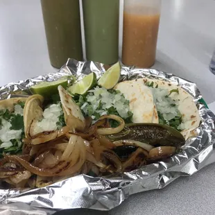 2 corn 2 flower beef tacos . Located inside the gas station