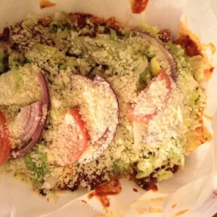 Mom's enchiladas- lots of Queso fresco, so ask for light if that's not your thing.