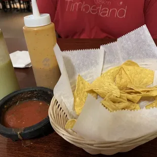 Chips and salsa and two extra sauces