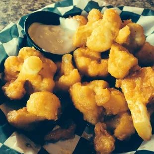 Breaded cauliflower in wing sauce
