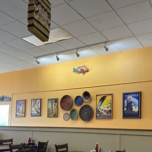 a dining room with tables and chairs