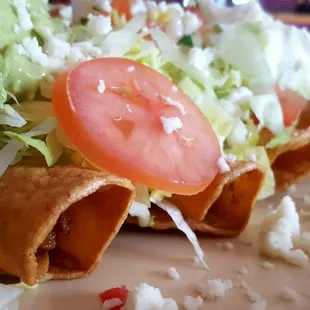 Roll taquitos.