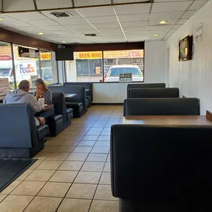 two people sitting in a restaurant